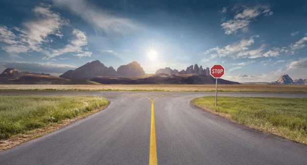 road intersection symbolizing mental roadblocks and choosing a new direction in life